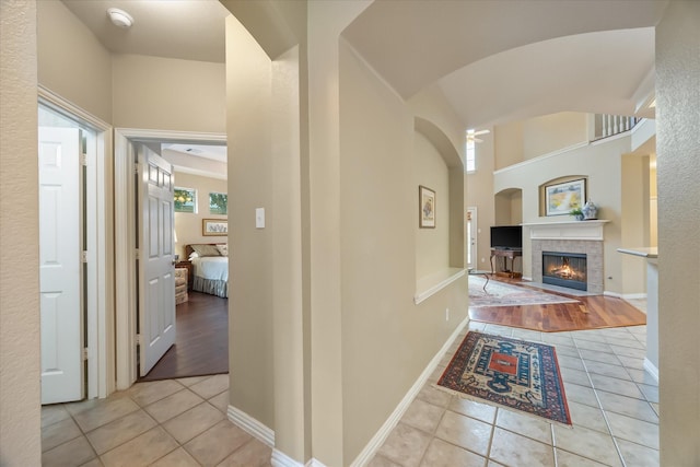 619 Loch View Ct, Rockwall, TX 75087 - hallway featuring tile patterned floors and arched walkways