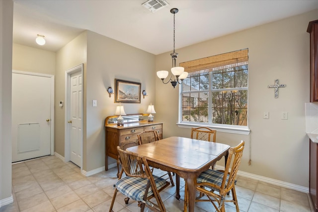 619 Loch View Ct, Rockwall, TX 75087 - dining room with a chandelier, baseboards, and light tile patterned flooring