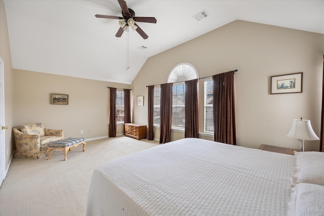 bedroom with light carpet, visible vents, baseboards, lofted ceiling, and ceiling fan