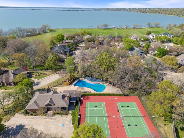 birds eye view of property featuring a water view and a residential view