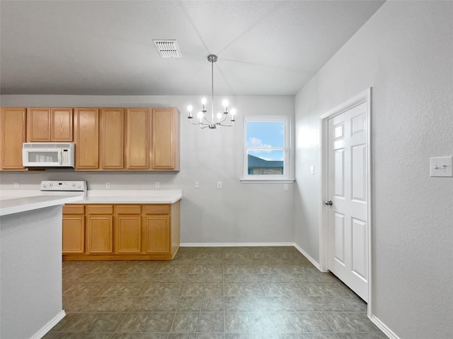 kitchen with white microwave, visible vents, light countertops, decorative light fixtures, and an inviting chandelier