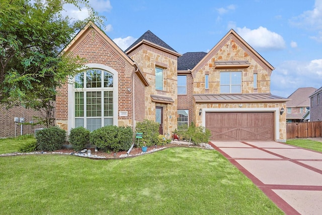 view of front of home with brick siding, concrete driveway, stone siding, a standing seam roof, and a front yard