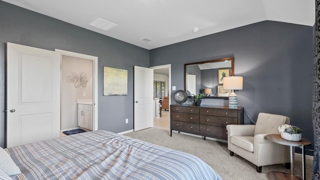 bedroom with light carpet, baseboards, visible vents, and lofted ceiling