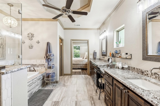 ensuite bathroom featuring crown molding, a garden tub, a sink, and ensuite bath