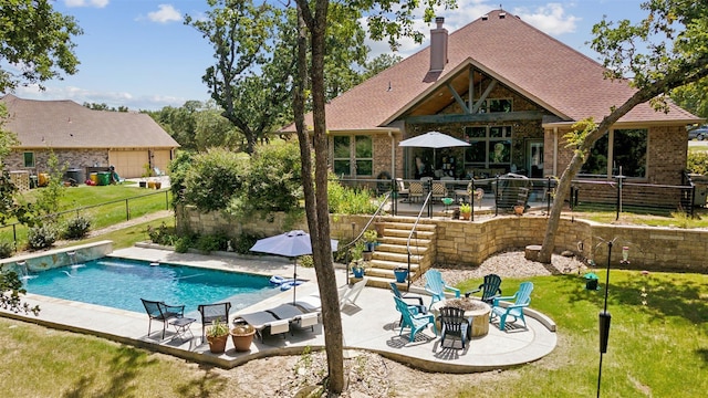 view of swimming pool with a fenced in pool, stairway, an outdoor fire pit, a patio area, and fence