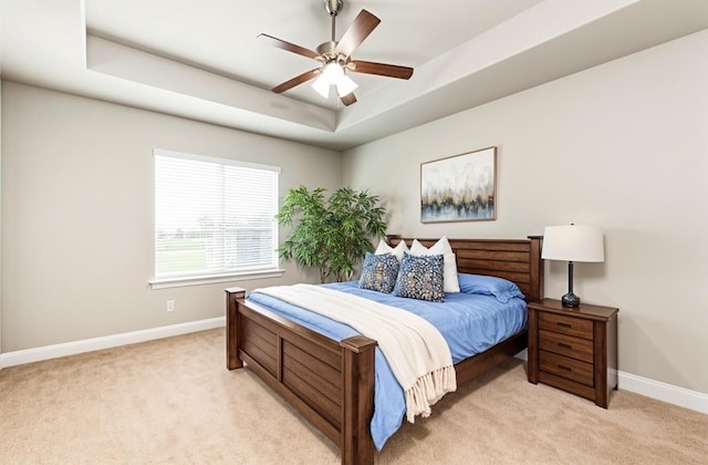 2601 Sabine Cir, Royse City, TX 75189 - bedroom featuring a raised ceiling, light colored carpet, and baseboards