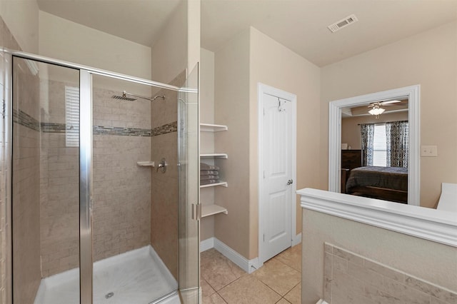 2601 Sabine Cir, Royse City, TX 75189 - bathroom featuring connected bathroom, a stall shower, tile patterned floors, and ceiling fan