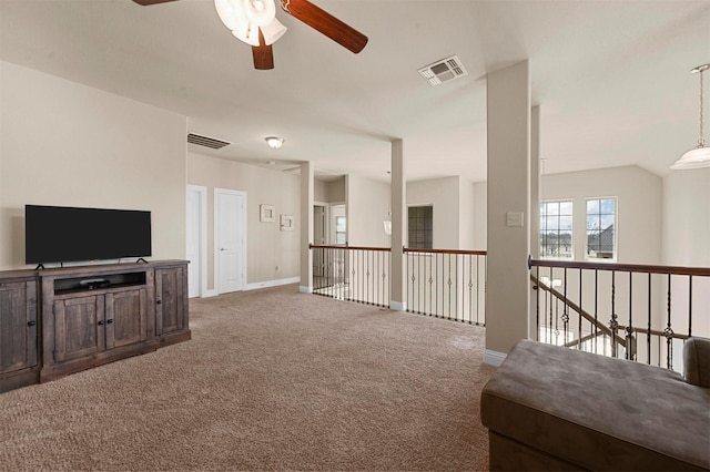 2601 Sabine Cir, Royse City, TX 75189 - carpeted living room featuring a ceiling fan and baseboards