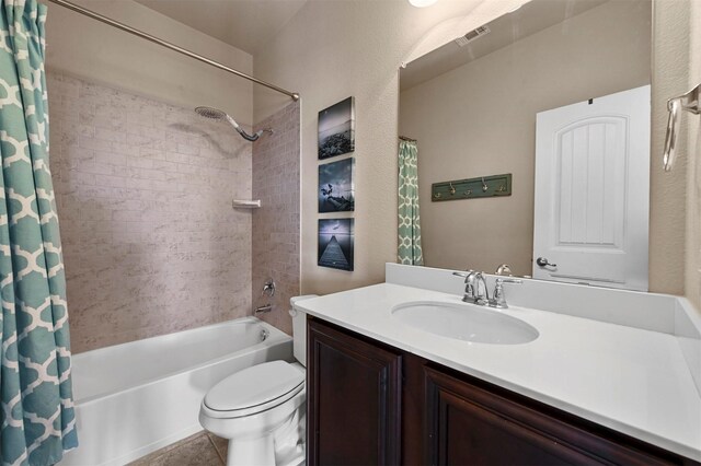 2601 Sabine Cir, Royse City, TX 75189 - bathroom featuring shower / tub combo with curtain, toilet, vanity, and tile patterned floors