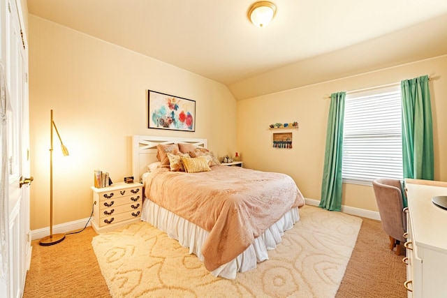 2601 Sabine Cir, Royse City, TX 75189 - bedroom with baseboards, light colored carpet, and lofted ceiling