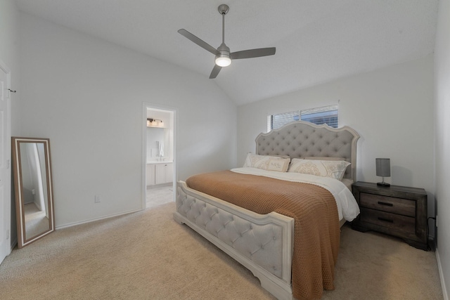 bedroom with lofted ceiling, connected bathroom, a ceiling fan, and light colored carpet