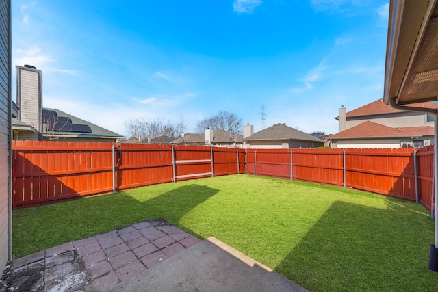 view of yard featuring a fenced backyard