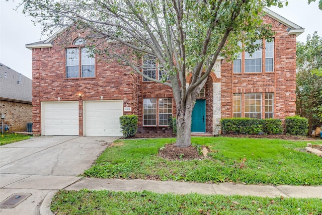 traditional home featuring driveway, a front yard, and brick siding