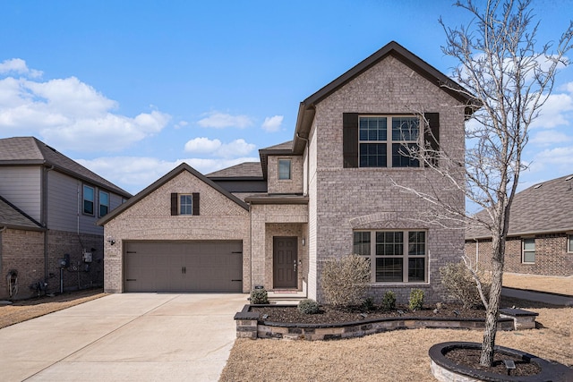 traditional-style house featuring a garage, concrete driveway, and brick siding