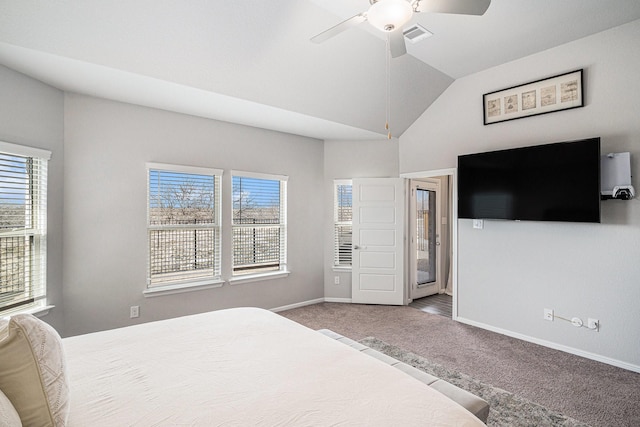 carpeted bedroom with visible vents, vaulted ceiling, baseboards, and ceiling fan