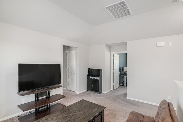 living room with light colored carpet, visible vents, and baseboards