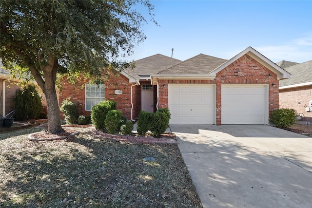 ranch-style house featuring concrete driveway, brick siding, an attached garage, and a shingled roof