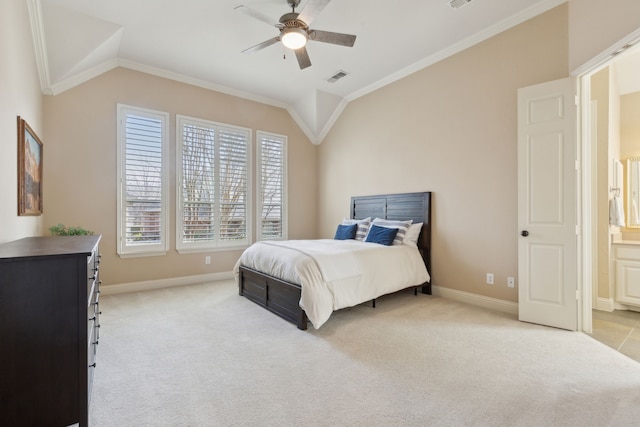 bedroom featuring light carpet, vaulted ceiling, baseboards, and crown molding