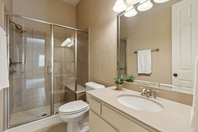 bathroom with toilet, a shower stall, vanity, a chandelier, and tile patterned flooring