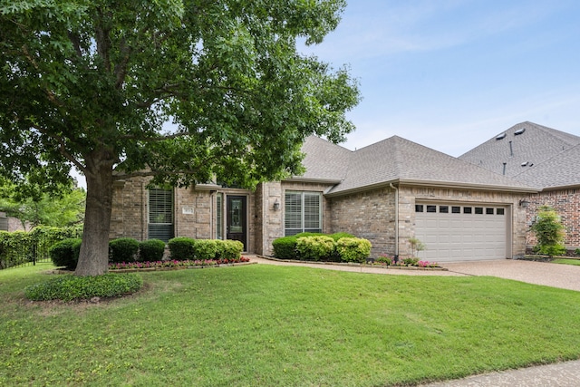 814 Barton Springs Dr, Fairview, TX 75069 - view of front facade featuring brick siding, an attached garage, a shingled roof, and a front yard