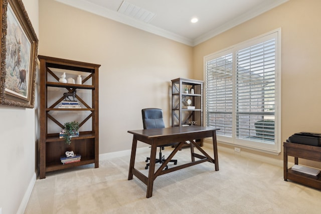 office space with ornamental molding, light carpet, visible vents, and baseboards