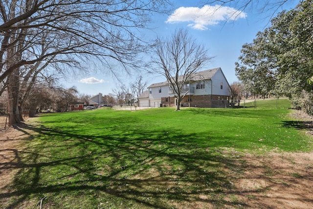 view of yard featuring fence