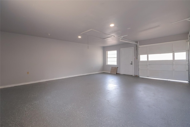 garage featuring baseboards