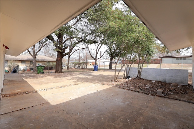 view of patio / terrace featuring fence