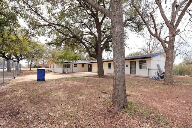 exterior space with a patio area and fence