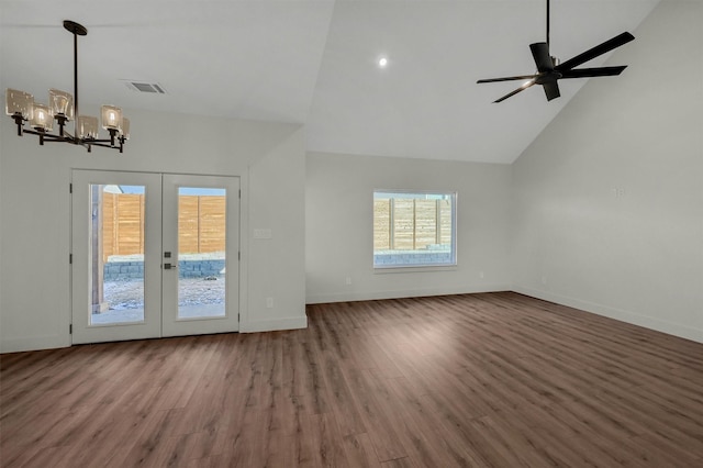 unfurnished living room with french doors, visible vents, wood finished floors, high vaulted ceiling, and baseboards