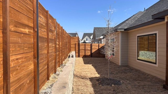 view of yard with fence