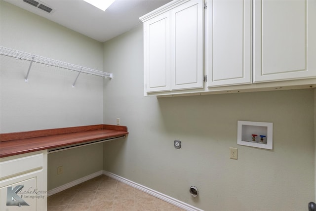 laundry area with washer hookup, visible vents, baseboards, cabinet space, and electric dryer hookup