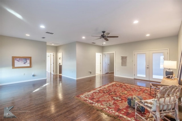 living room with french doors, dark wood-style flooring, visible vents, and recessed lighting