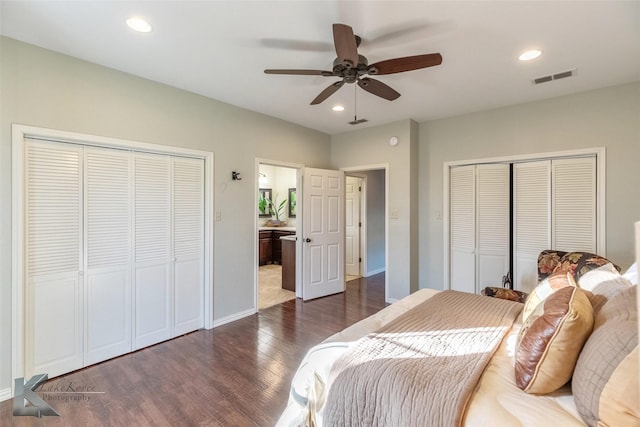 bedroom with baseboards, visible vents, dark wood finished floors, and recessed lighting