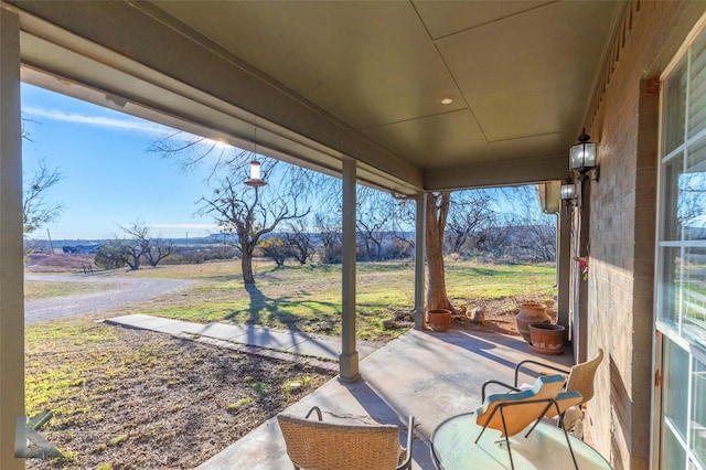 view of patio with a rural view