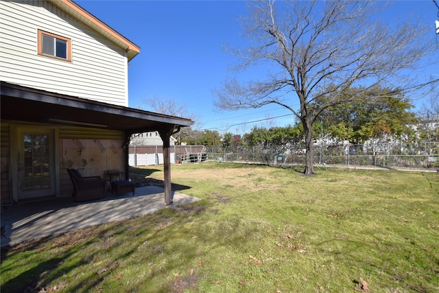 view of yard featuring a patio and a fenced backyard