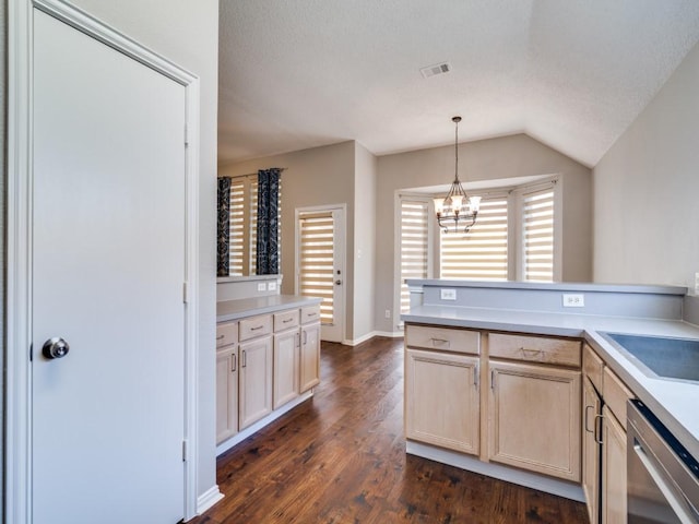 kitchen featuring dishwasher, light countertops, light brown cabinetry, and dark wood finished floors