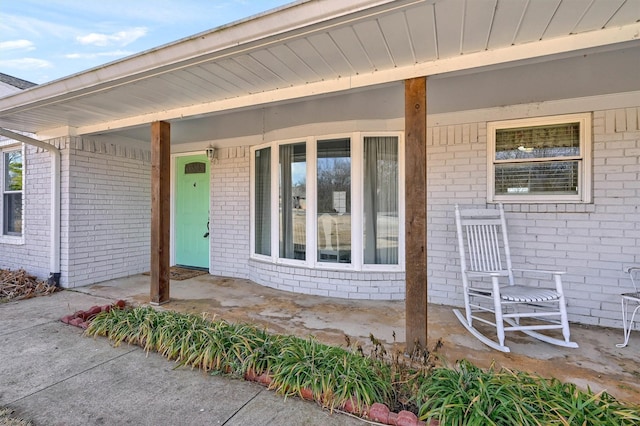 doorway to property with a porch