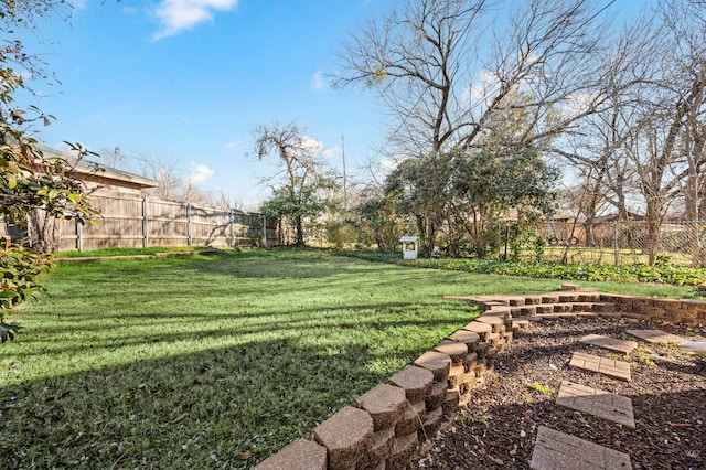 view of yard featuring a fenced backyard