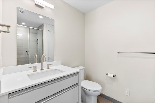 bathroom with toilet, recessed lighting, vanity, visible vents, and a shower stall