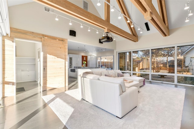 living room featuring high vaulted ceiling, visible vents, and beam ceiling