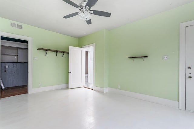 unfurnished bedroom with a ceiling fan, visible vents, and baseboards