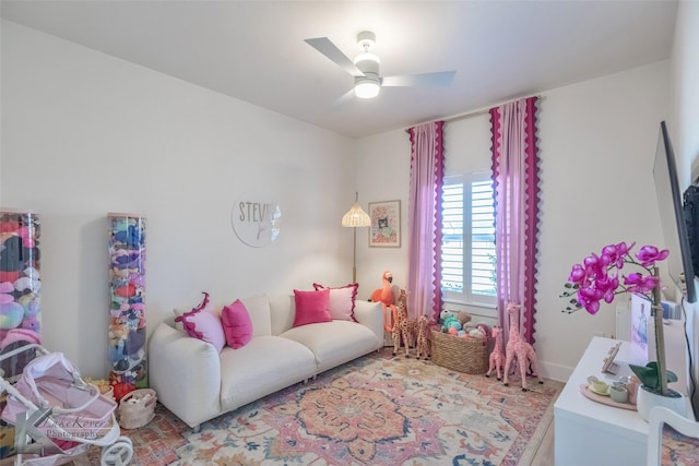 living room featuring a ceiling fan