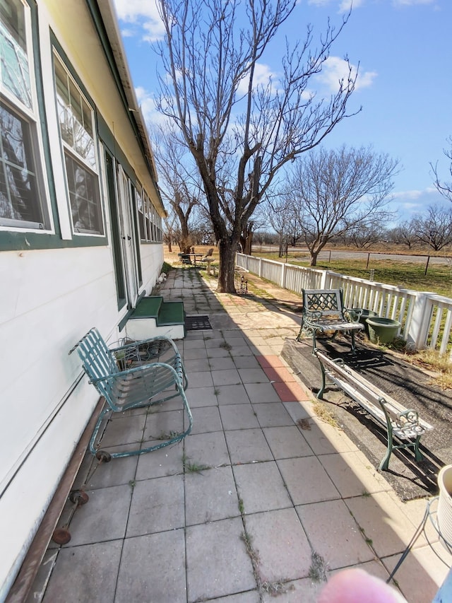 view of patio with fence