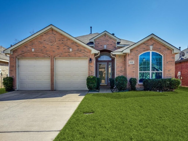 ranch-style house with brick siding, an attached garage, concrete driveway, and a front lawn