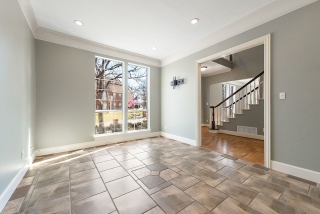 spare room featuring crown molding, recessed lighting, visible vents, stairway, and baseboards