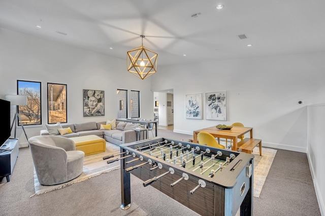 playroom featuring carpet floors, recessed lighting, visible vents, and baseboards