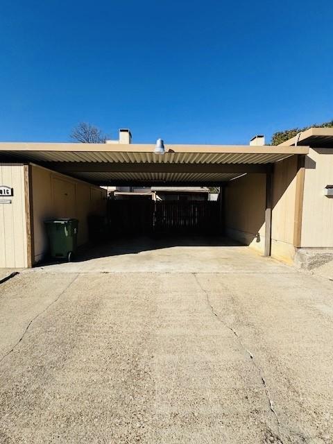 view of car parking featuring a carport