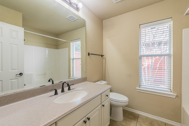 full bath featuring a shower, visible vents, and a wealth of natural light