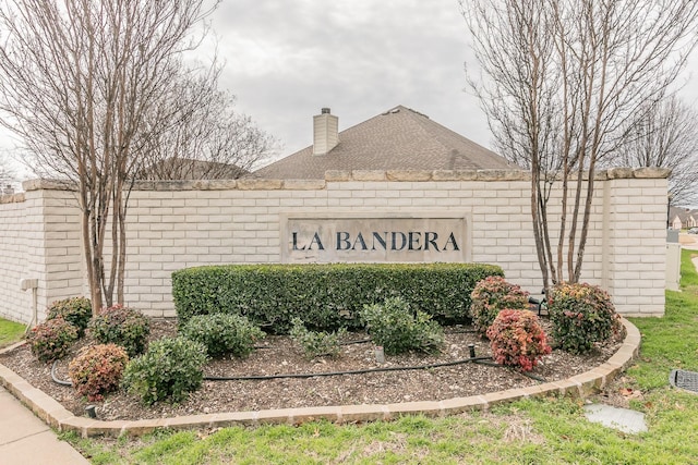 view of community sign